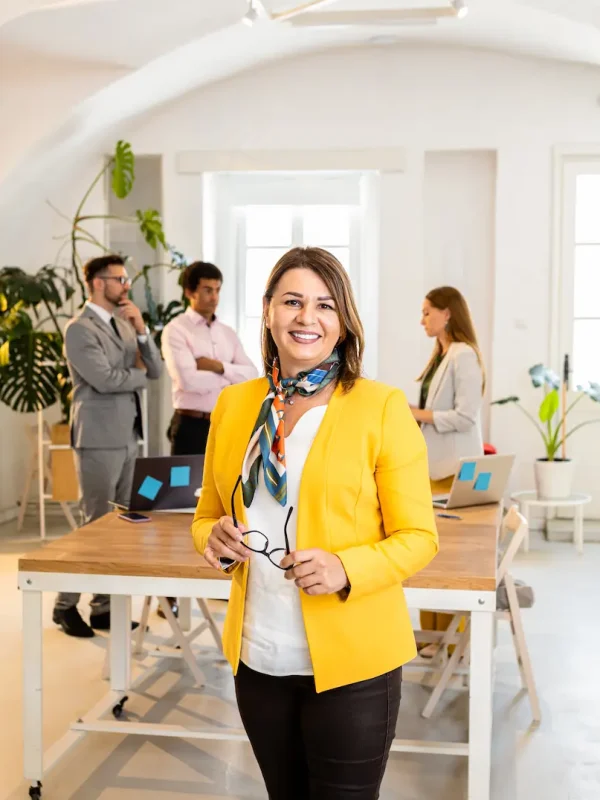 portrait-of-smiling-businesswoman-in-office-with-h-2025-01-29-12-20-34-utc